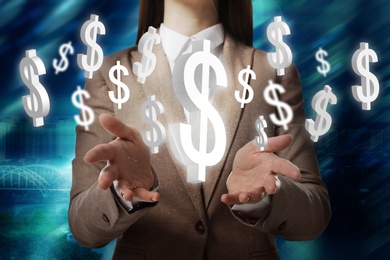 Image of Money exchange concept. Businesswoman with dollar currency symbols on blue background, closeup