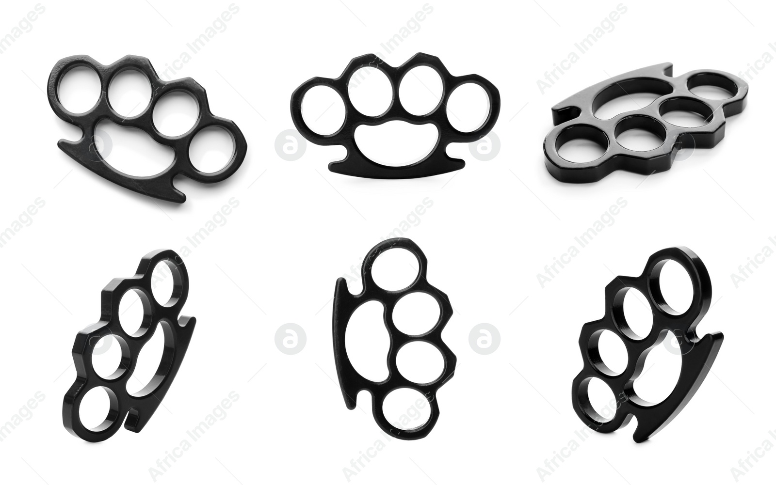 Image of Set with metal black brass knuckles on white background 