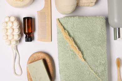 Bath accessories. Different personal care products and dry spikelet on white background, flat lay