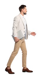 Photo of Man with laptop walking on white background