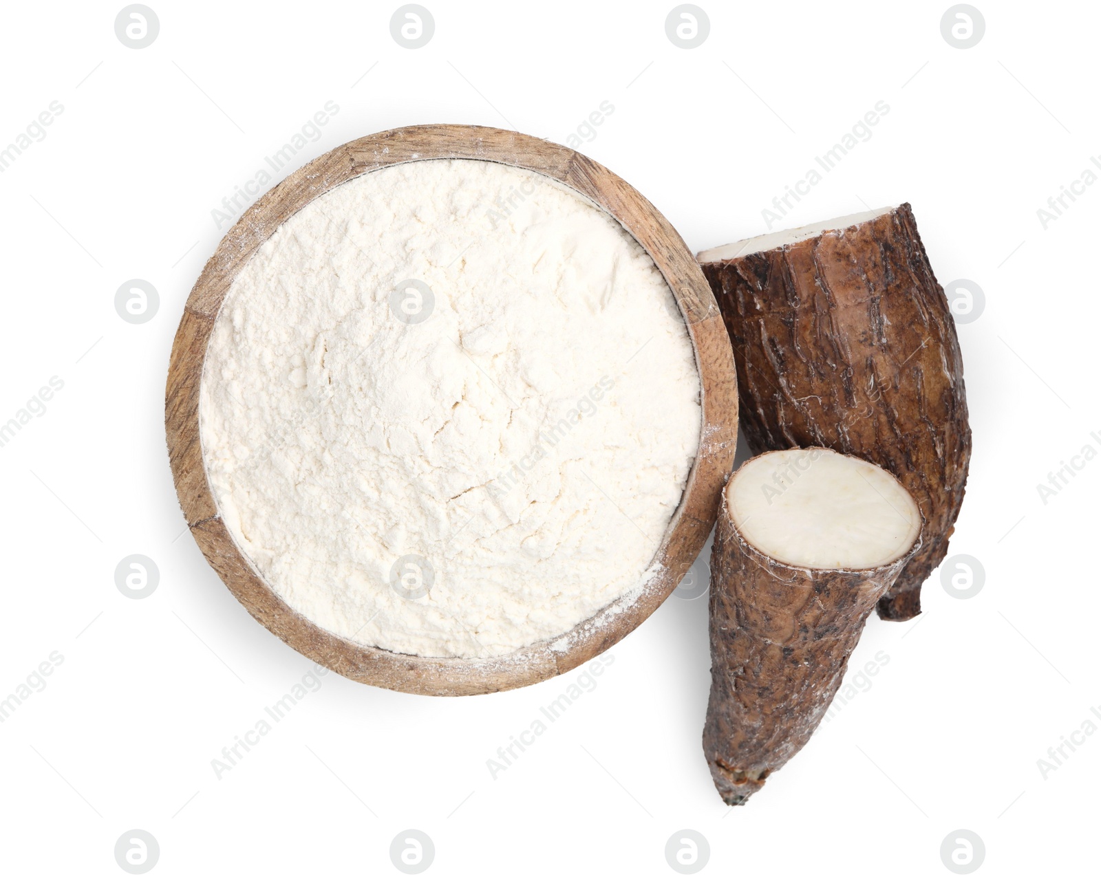 Photo of Bowl with cassava flour and cut root isolated on white, top view