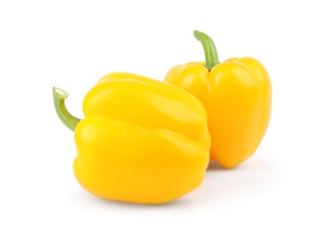 Ripe yellow bell peppers isolated on white