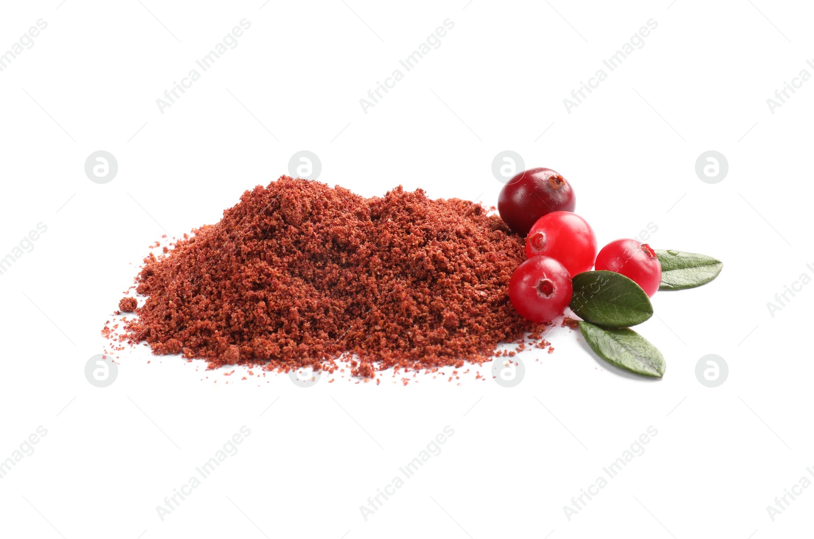 Photo of Dried cranberry powder, fresh berries and green leaves isolated on white