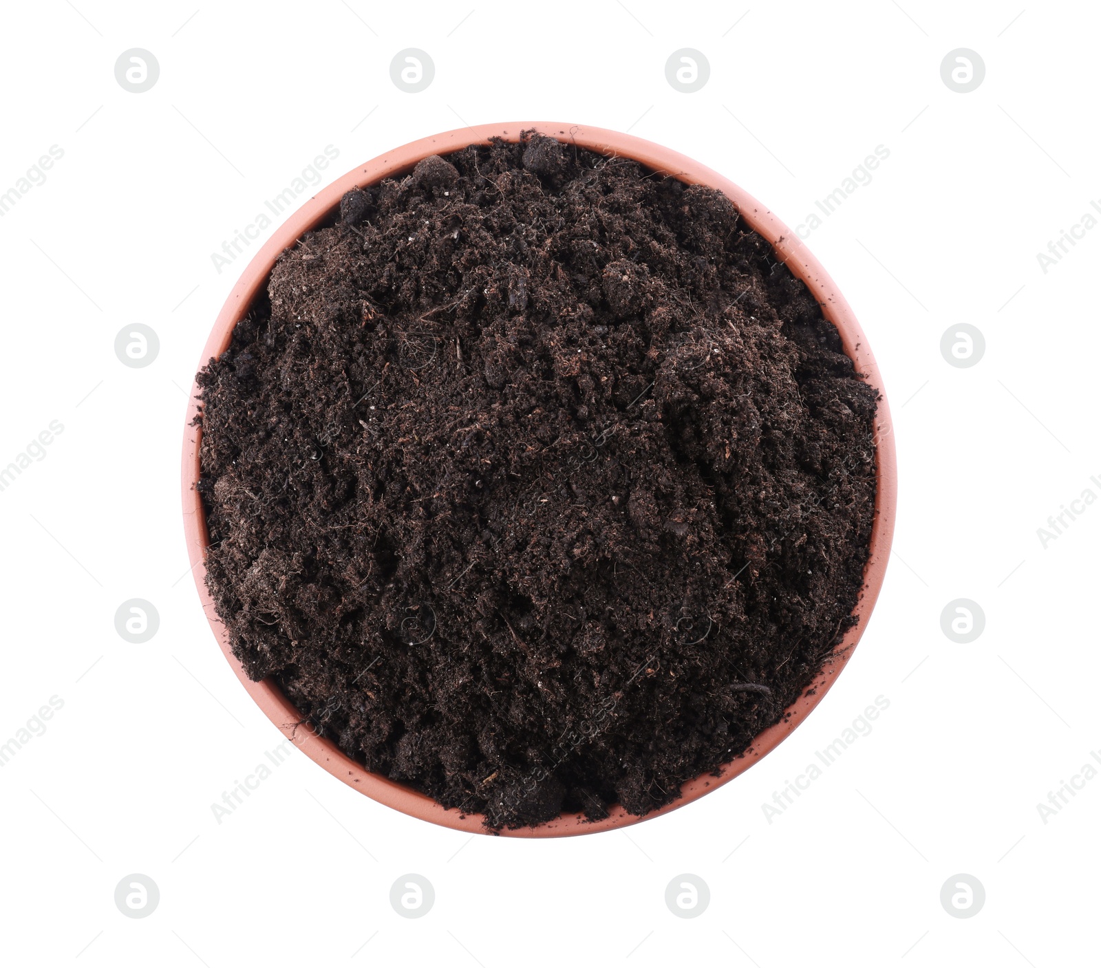 Photo of Terracotta flower pot with soil isolated on white, top view