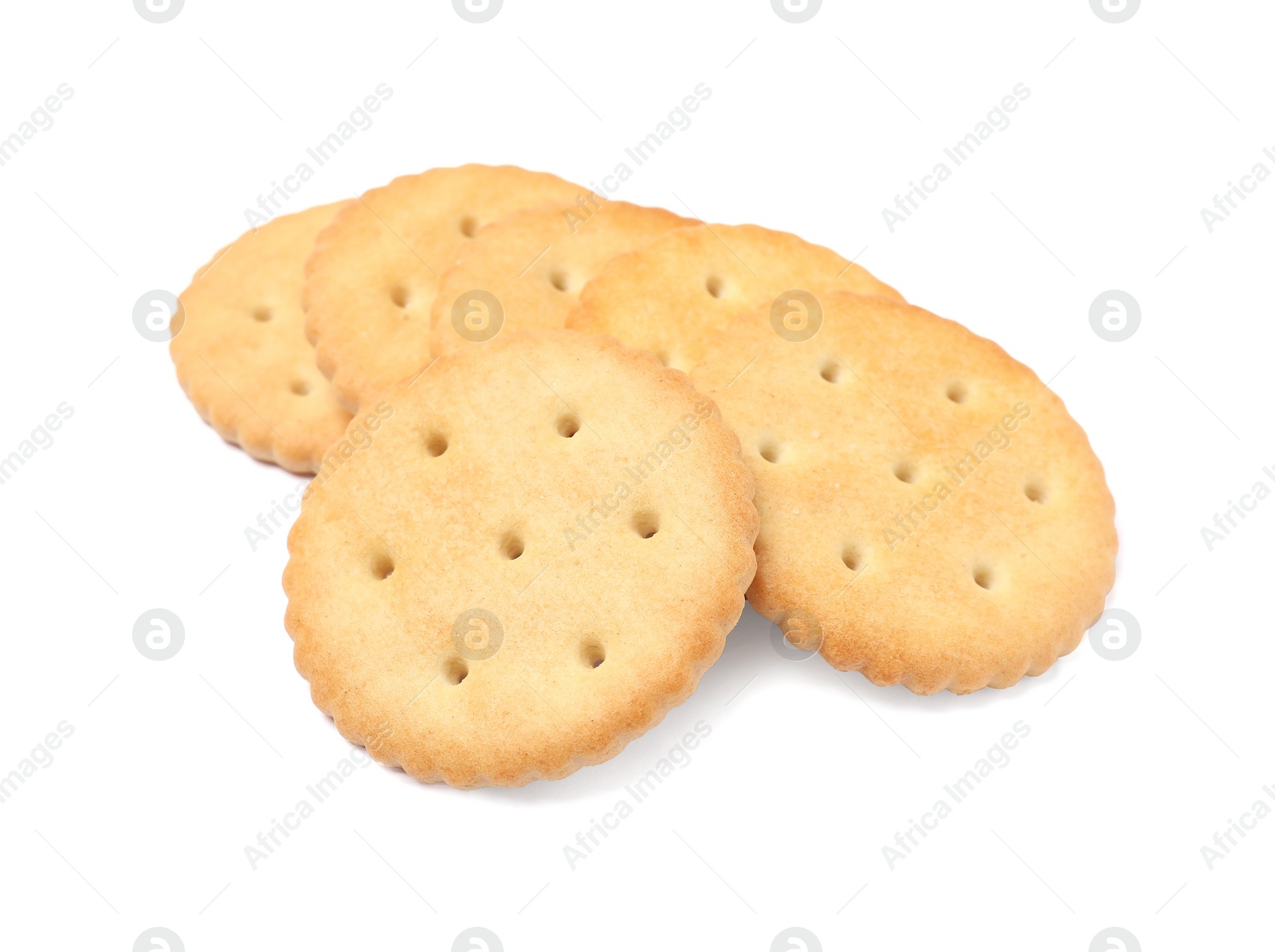 Photo of Tasty crispy round crackers isolated on white