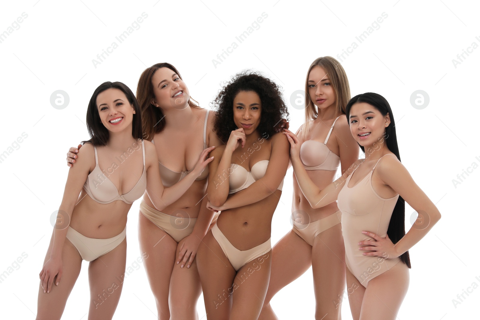 Photo of Group of women with different body types in underwear on white background