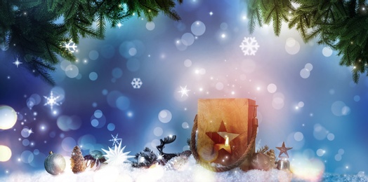 Composition with wooden Christmas lantern on snow against color background, banner design. Bokeh effect