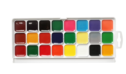 Photo of Plastic watercolor palette on white background, top view. Painting equipment for children