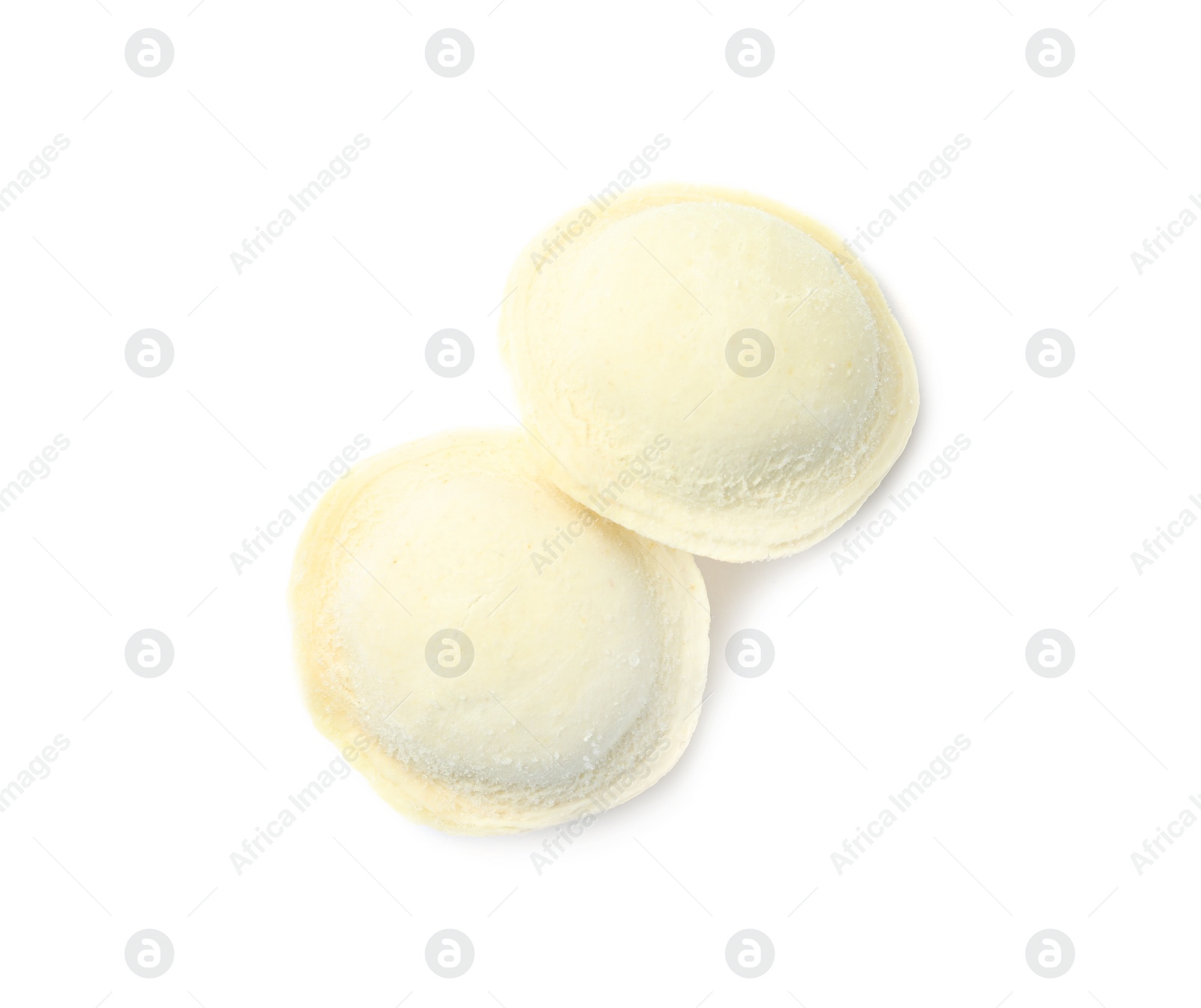 Photo of Frozen raw dumplings on white background, top view