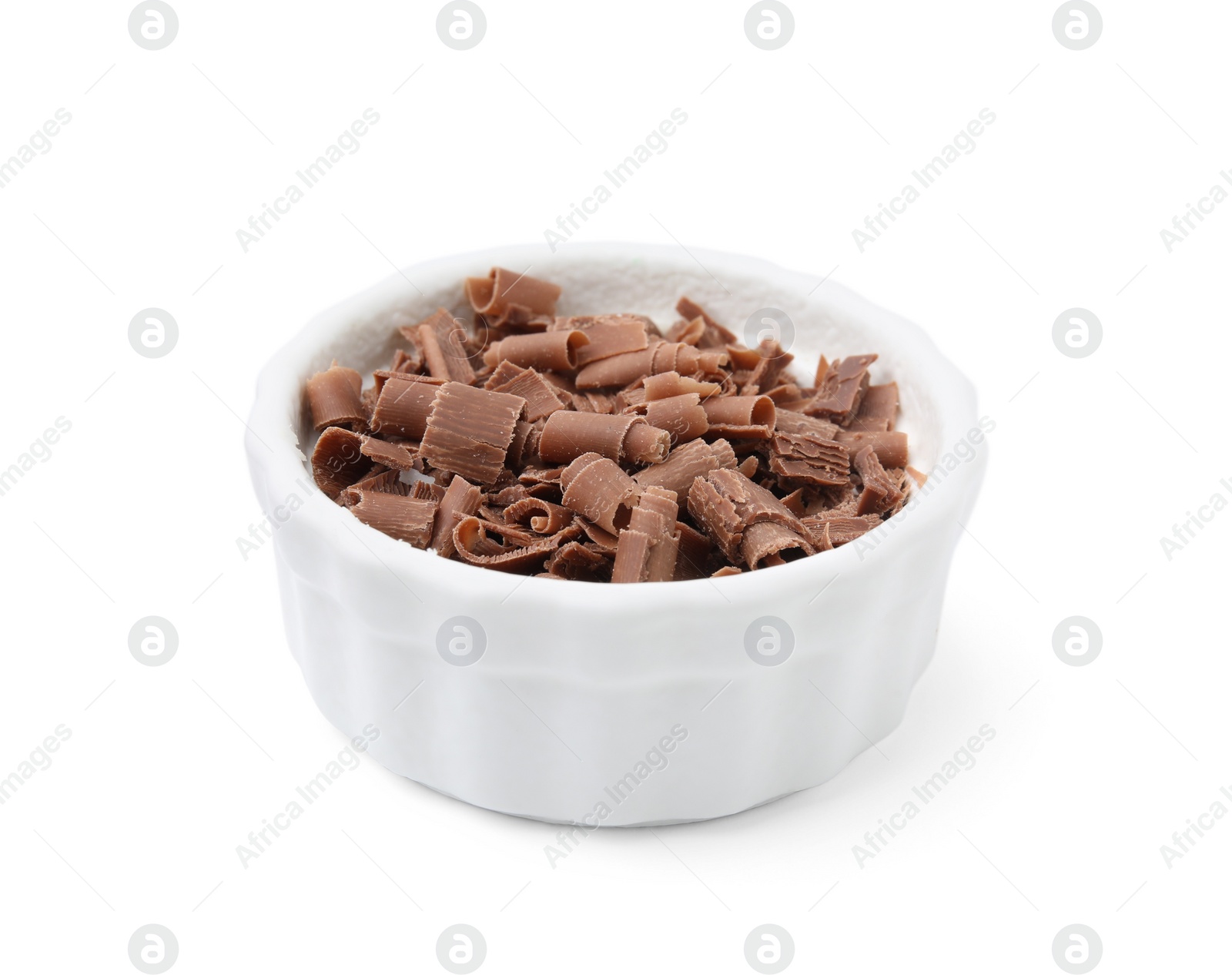 Photo of Bowl of tasty chocolate shavings isolated on white