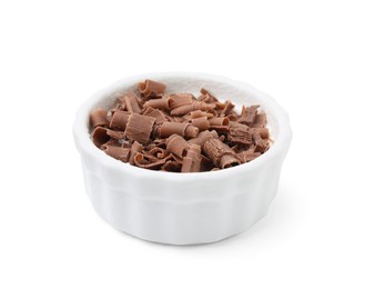 Photo of Bowl of tasty chocolate shavings isolated on white