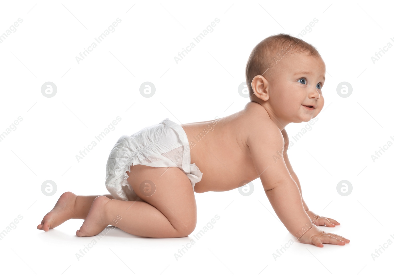 Photo of Cute little baby in diaper crawling on white background