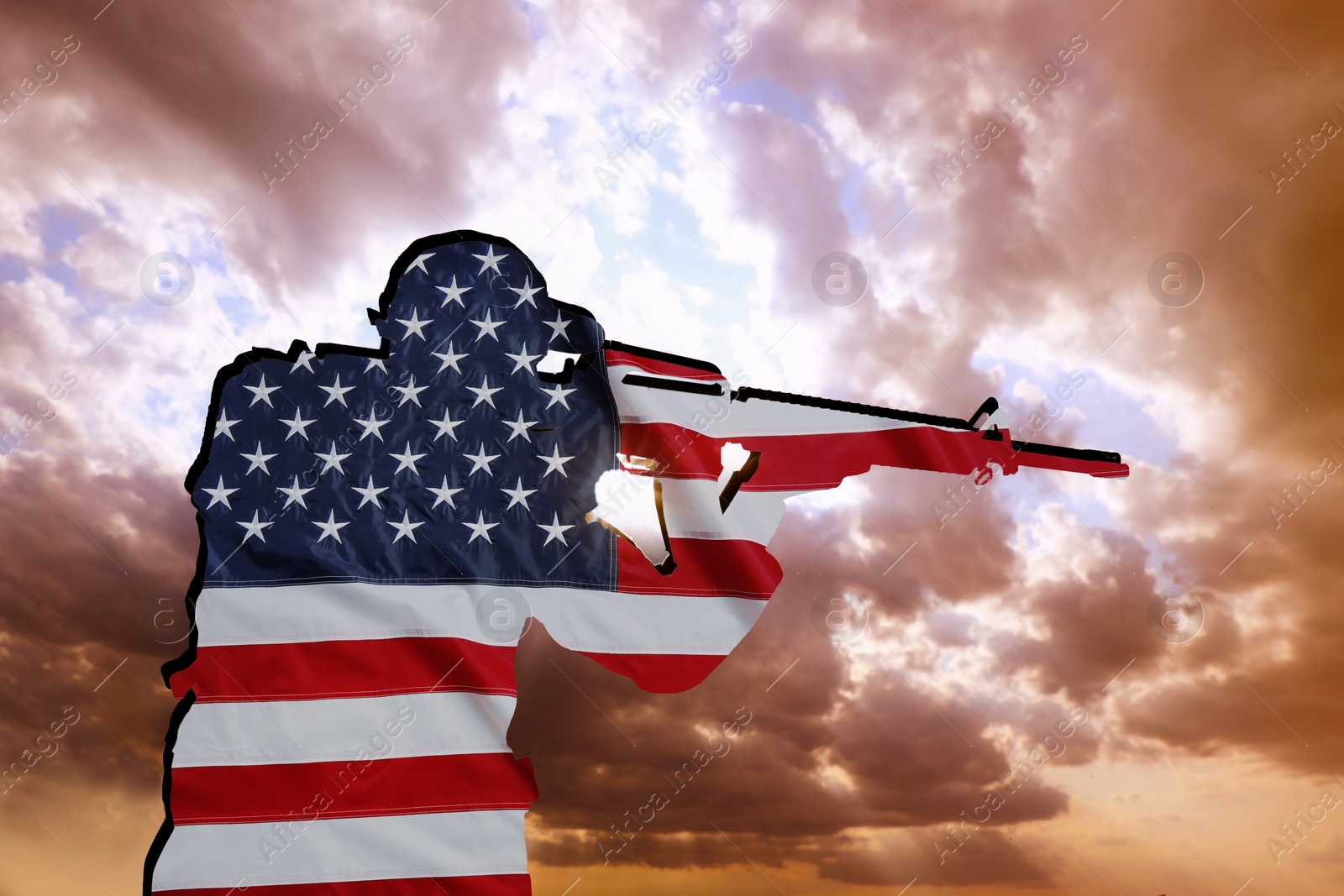 Image of Silhouette of soldier with assault rifle made of USA flag outdoors. Military service