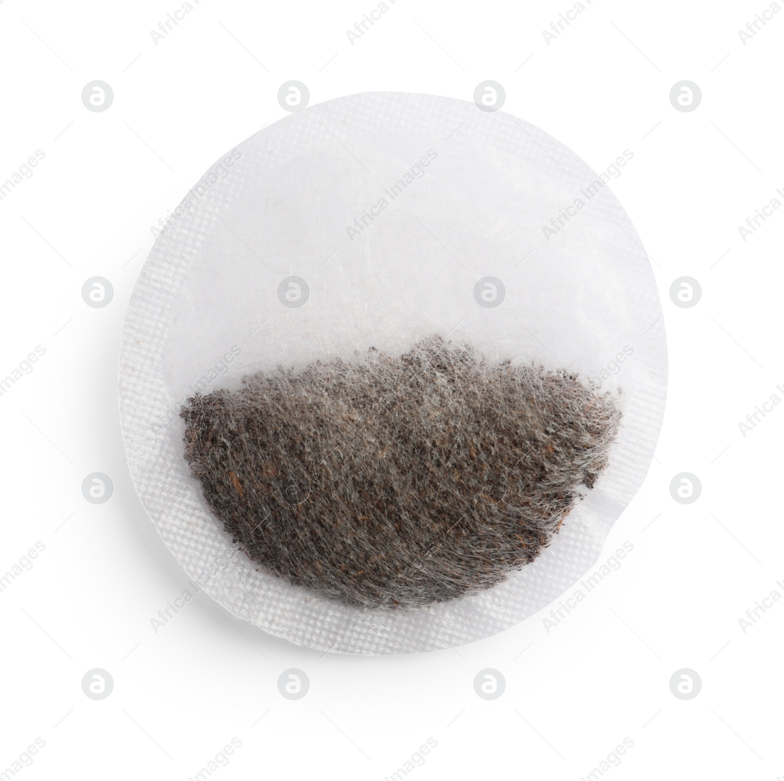 Photo of New round tea bag isolated on white, top view