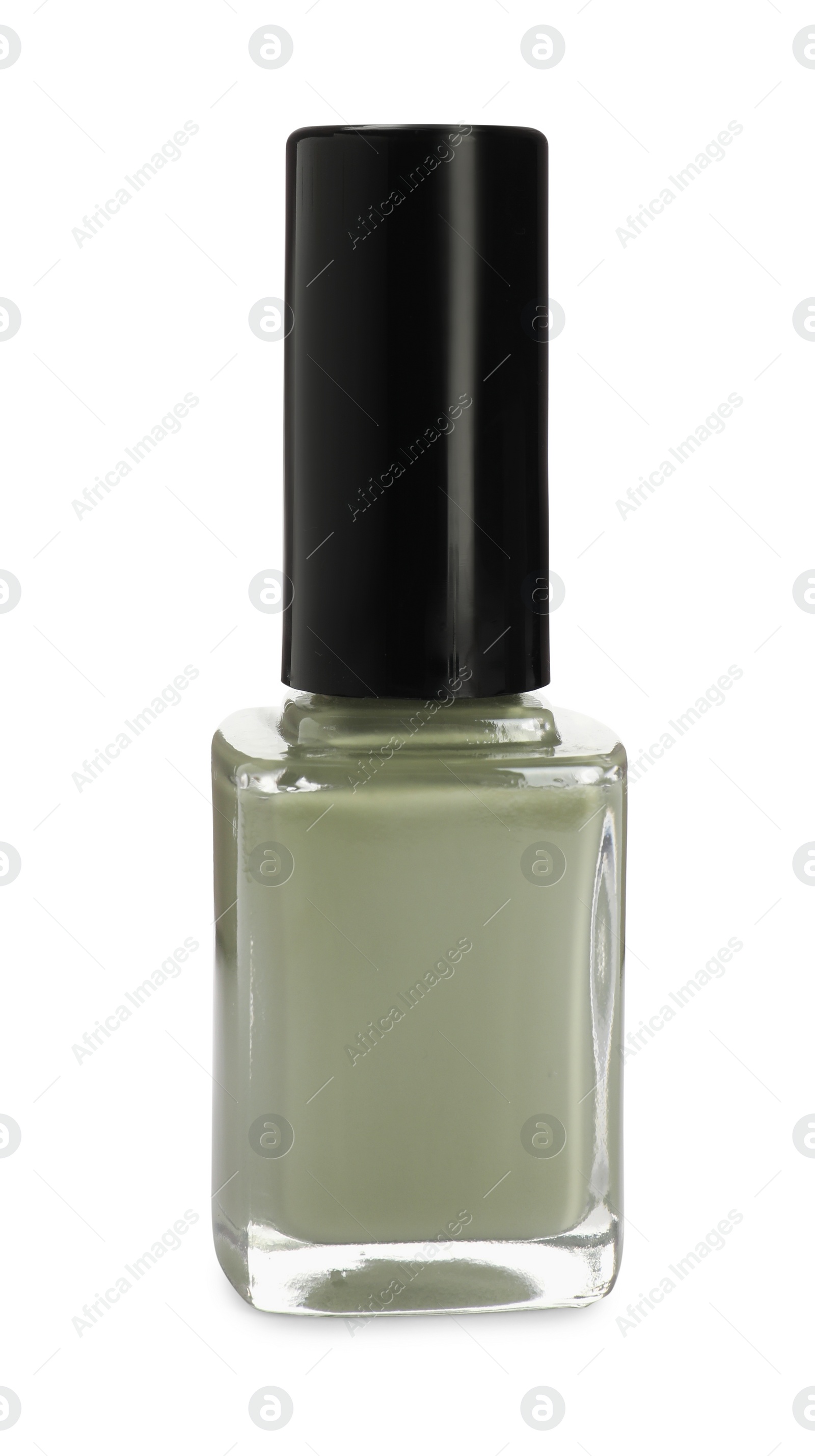 Photo of Green nail polish in bottle isolated on white
