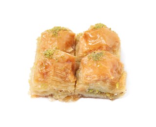 Delicious baklava with pistachios on white background