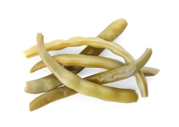 Pile of canned green beans on white background, top view