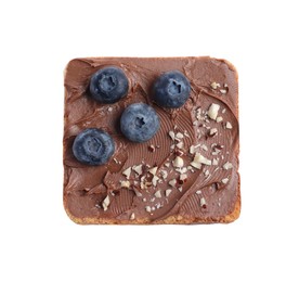 Photo of Toast with tasty nut butter, blueberries and nuts isolated on white, top view