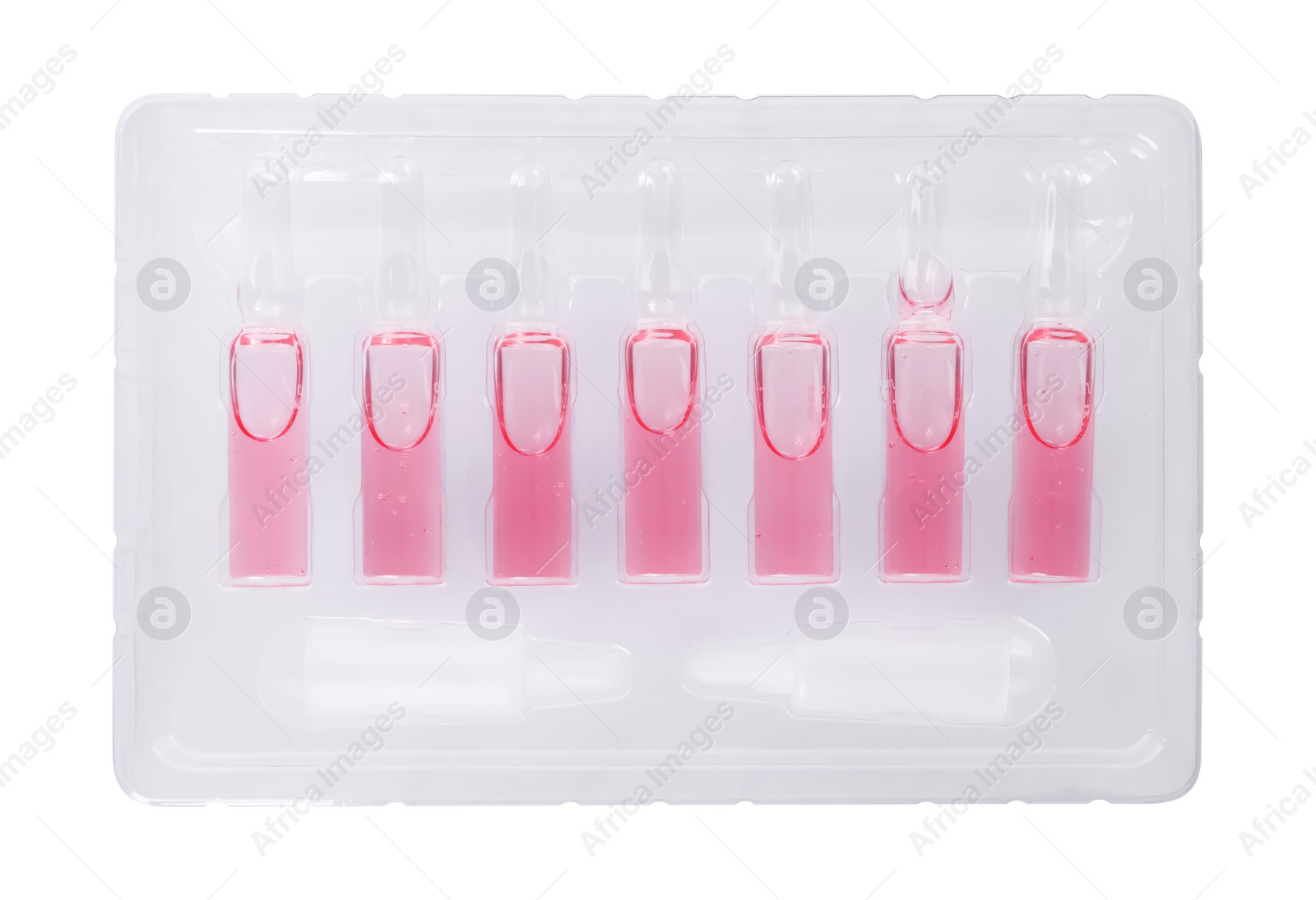 Photo of Glass ampoules with pharmaceutical product in tray on white background, top view