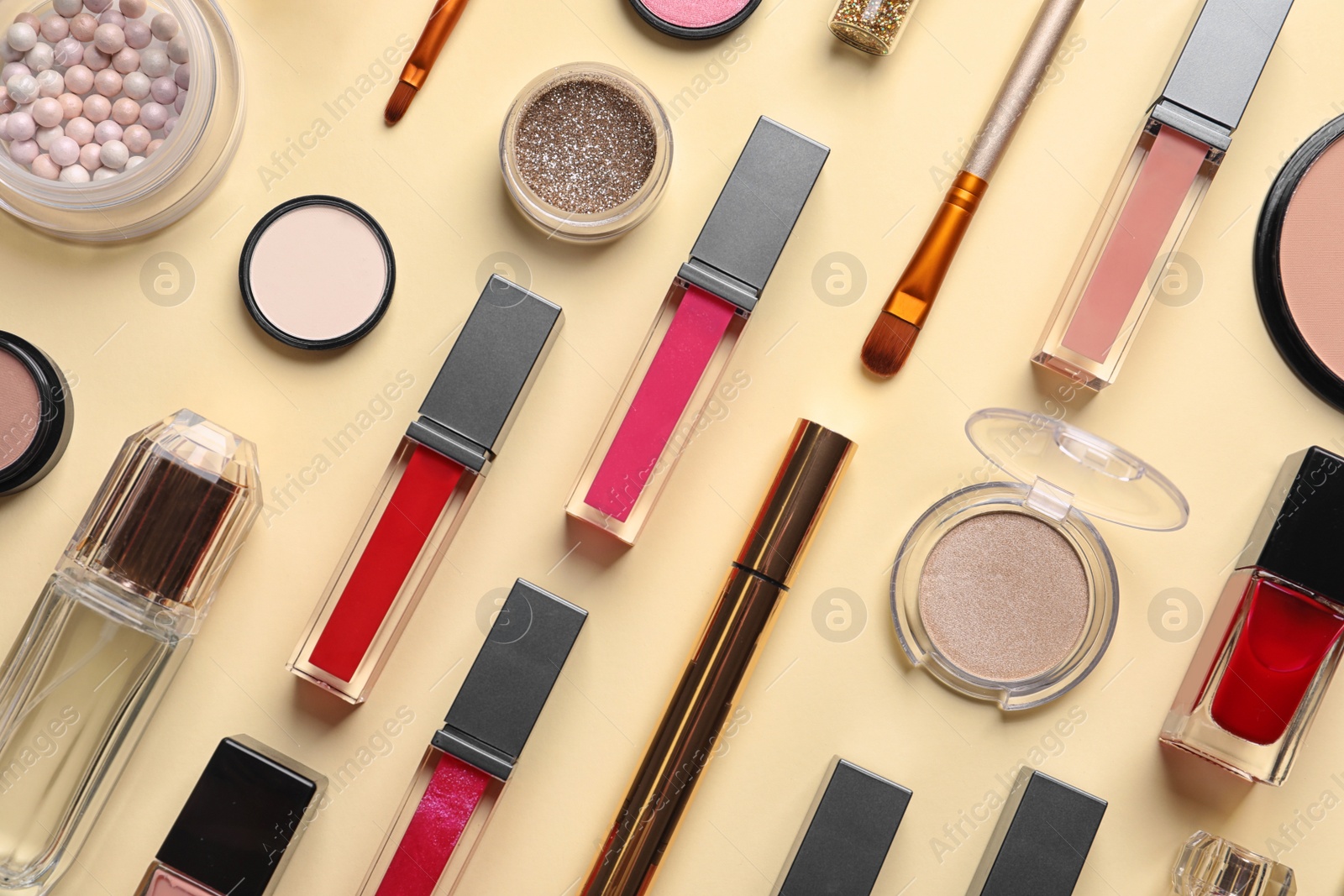 Photo of Beautiful composition with lipsticks on color background, flat lay