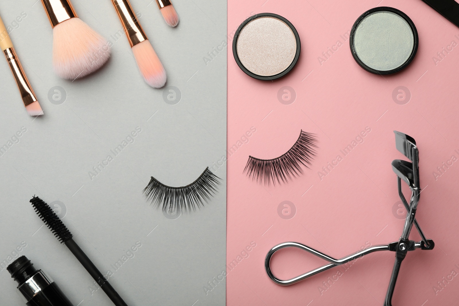 Photo of Flat lay composition with artificial eyelashes and accessories on color background