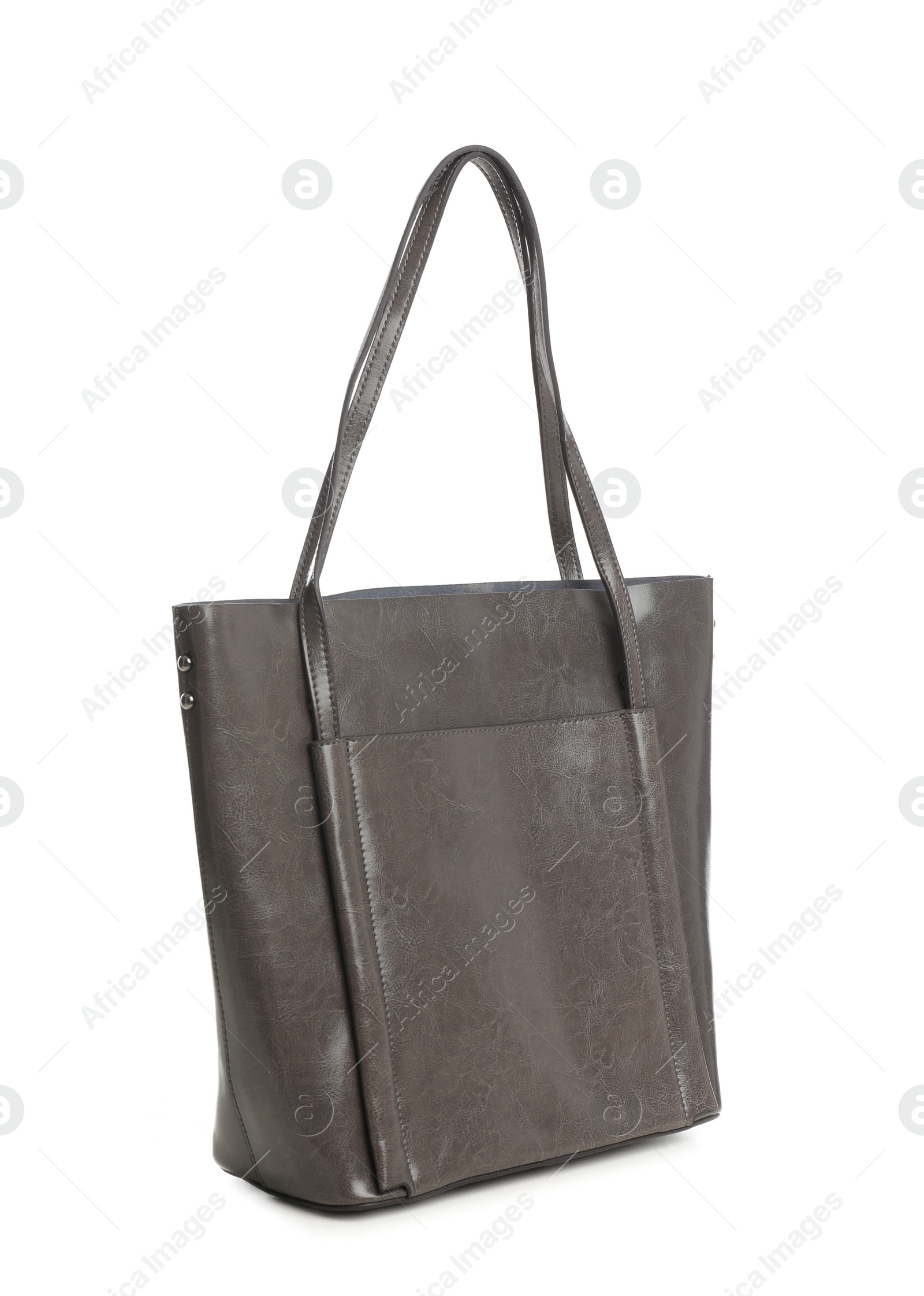 Photo of New leather shopper bag on white background