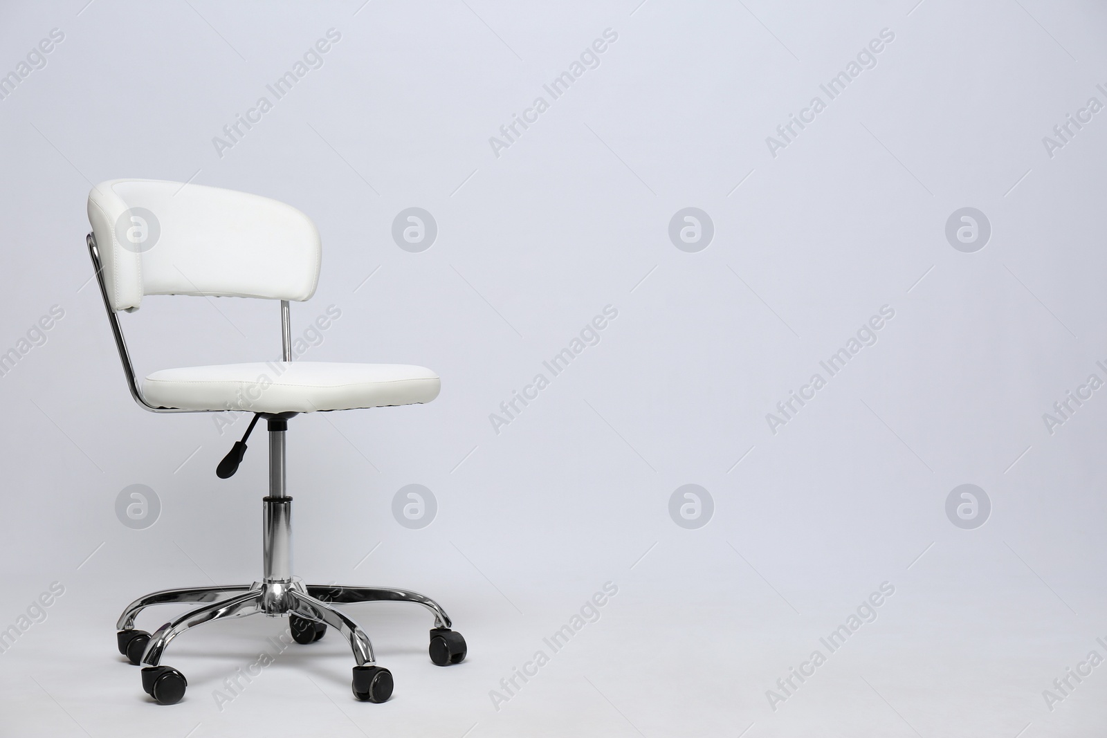 Photo of Comfortable office chair on white background, space for text