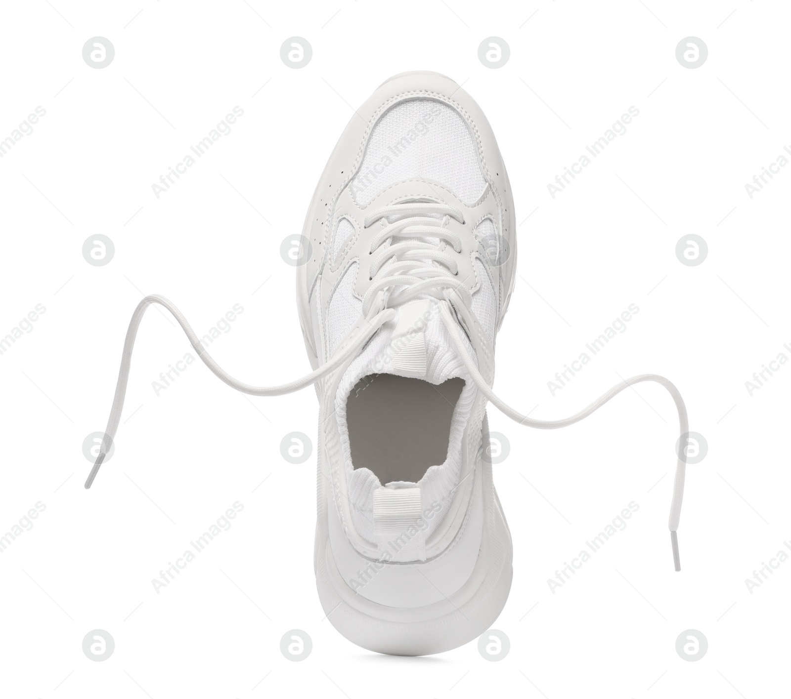 Photo of One stylish new sneaker isolated on white