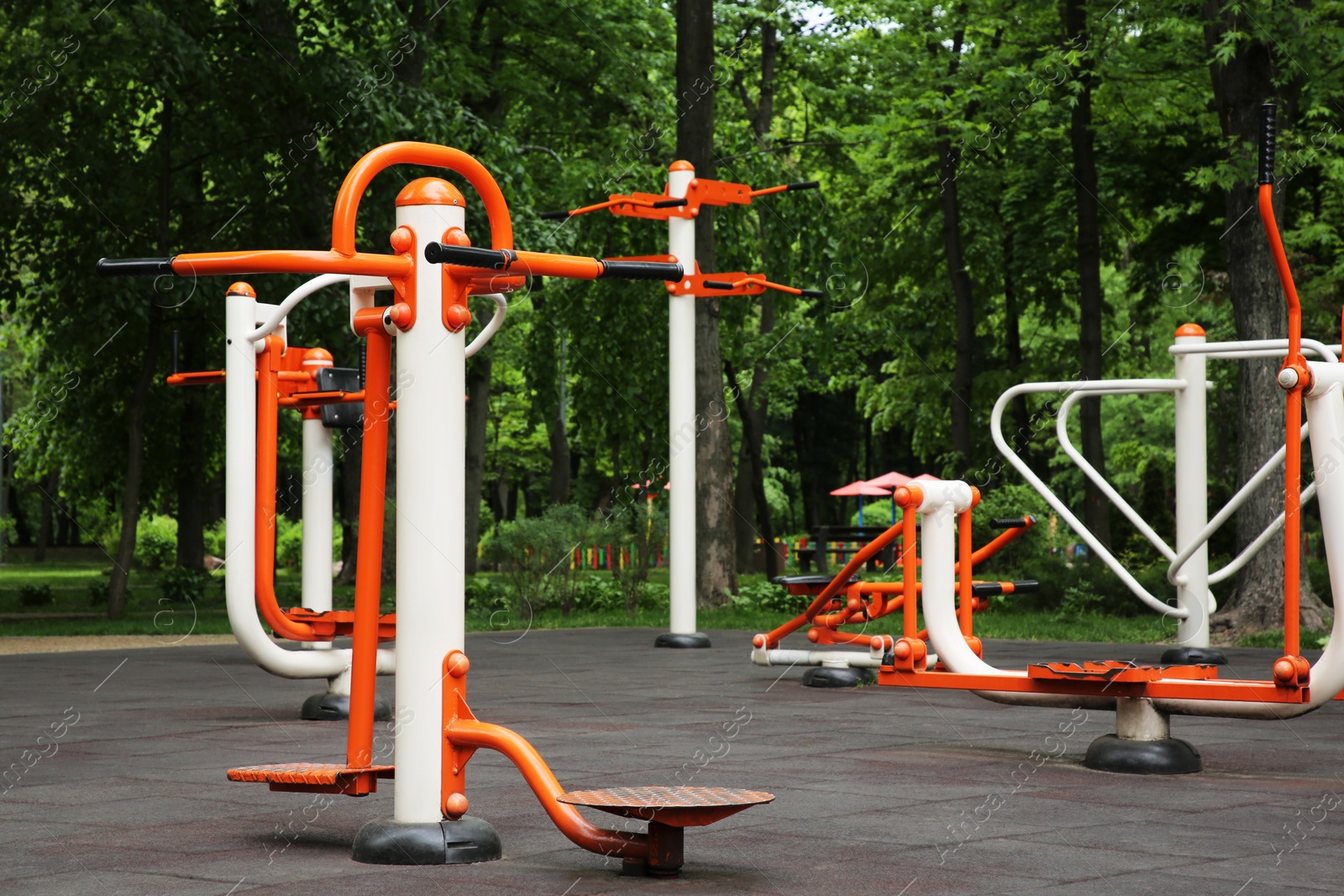 Photo of Empty outdoor gym with air walker, ovate stepper, twister and surfer