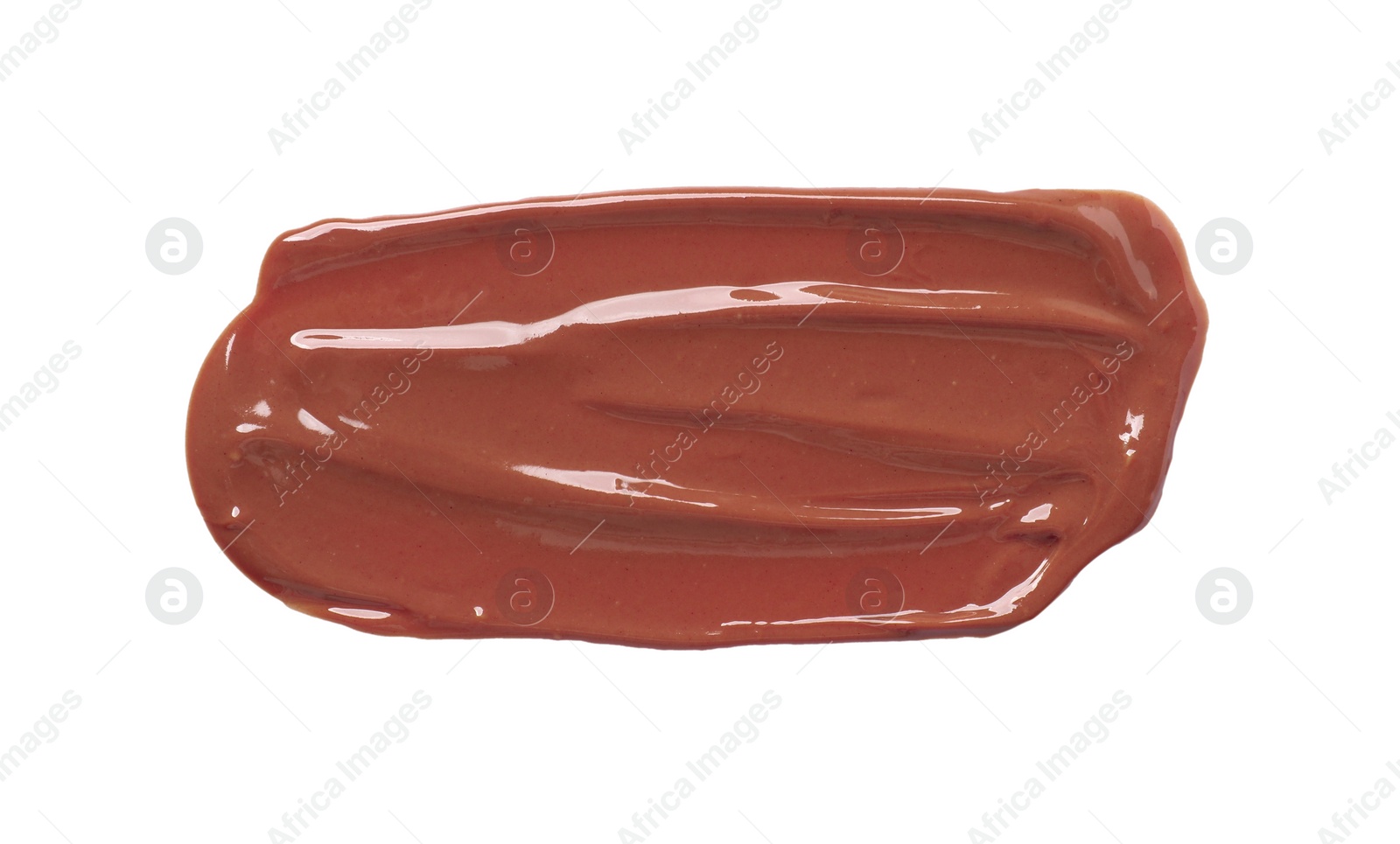 Photo of Smear of tasty milk chocolate paste isolated on white, top view