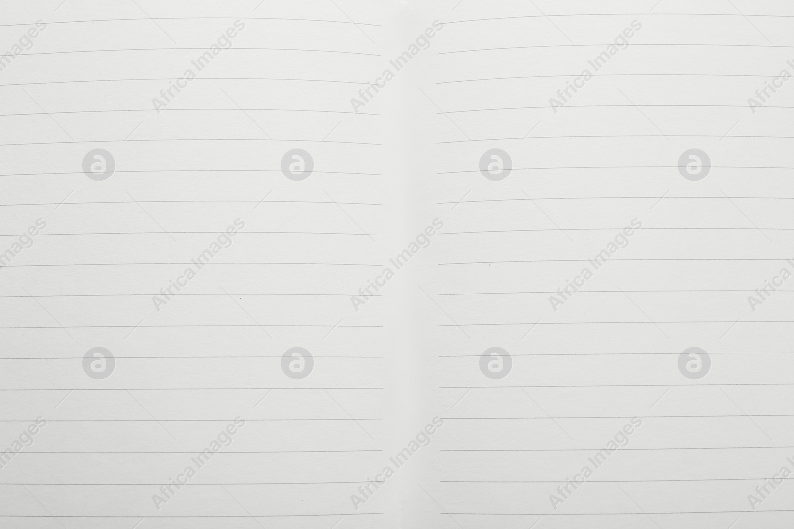 Photo of Lined notebook sheets as background, top view