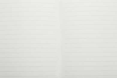 Photo of Lined notebook sheets as background, top view