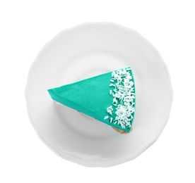 Photo of Piece of tasty spirulina cheesecake on white background, top view
