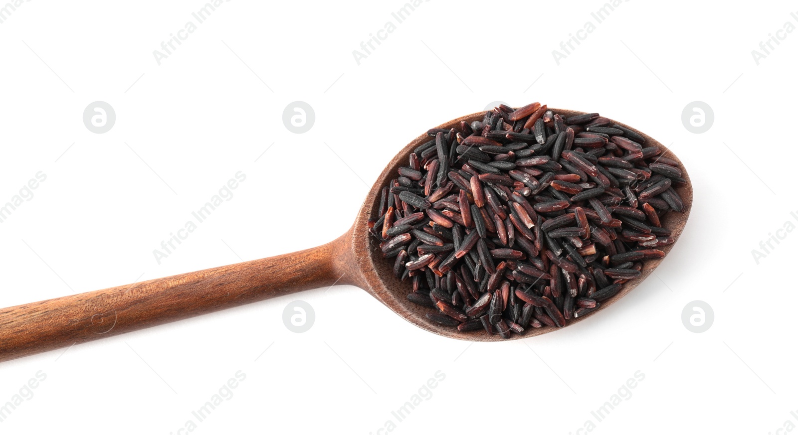 Photo of Brown rice in spoon isolated on white, top view