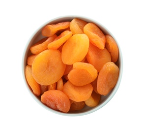 Photo of Bowl with apricots on white background, top view. Dried fruit as healthy food