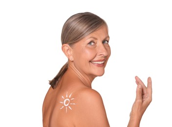 Photo of Beautiful senior woman with sun protection cream on her back isolated on white