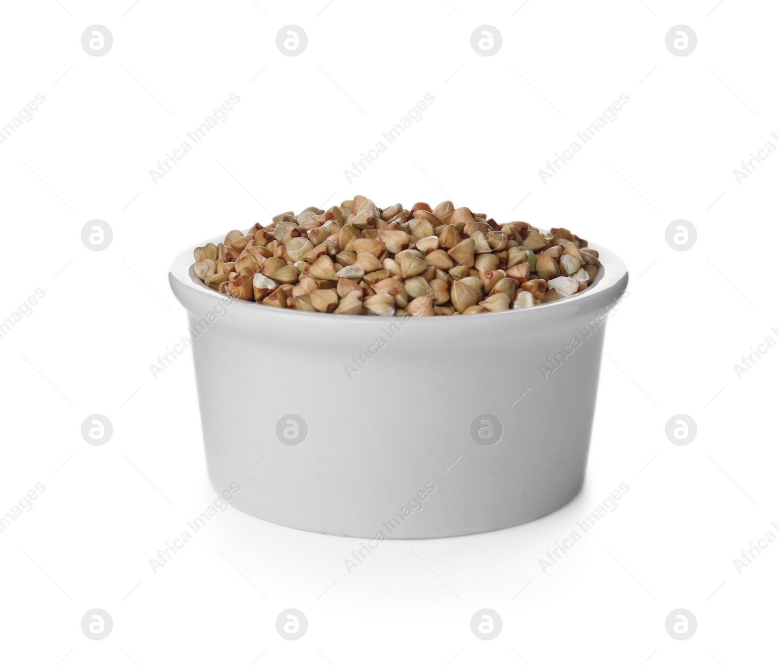 Photo of Organic green buckwheat in bowl isolated on white