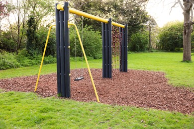 Beautiful green park with playground. Outdoor recreation