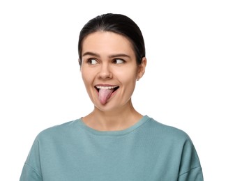 Photo of Happy young woman showing her tongue on white background