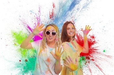 Holi festival celebration. Happy women covered with colorful powder dyes on white background