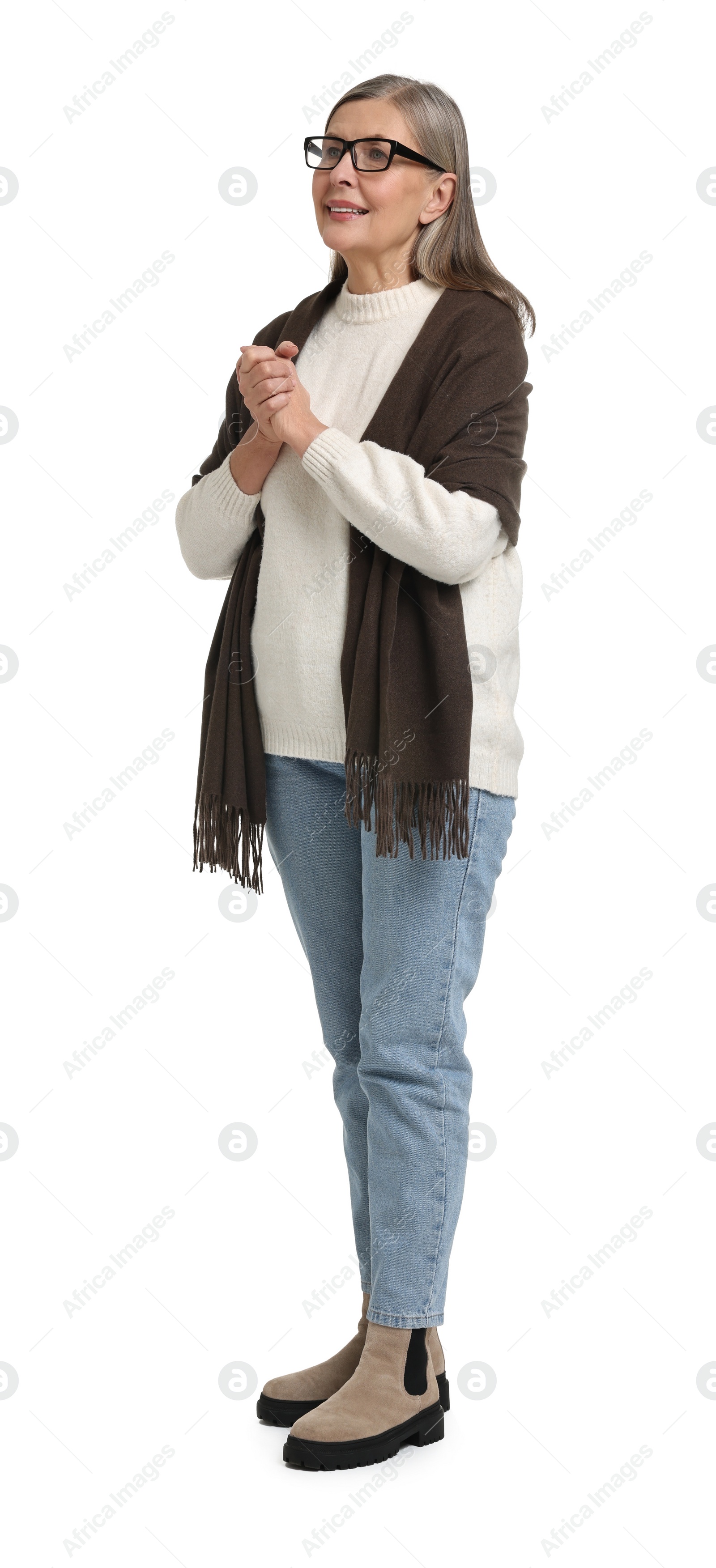 Photo of Full length portrait of senior woman on white background