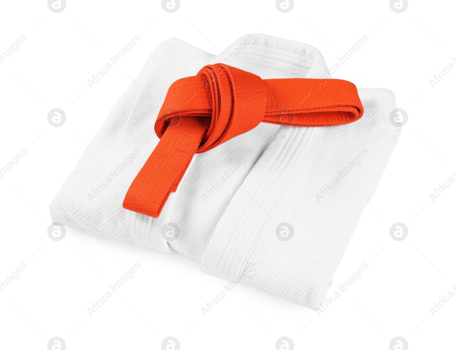 Photo of Orange karate belt and kimono isolated on white