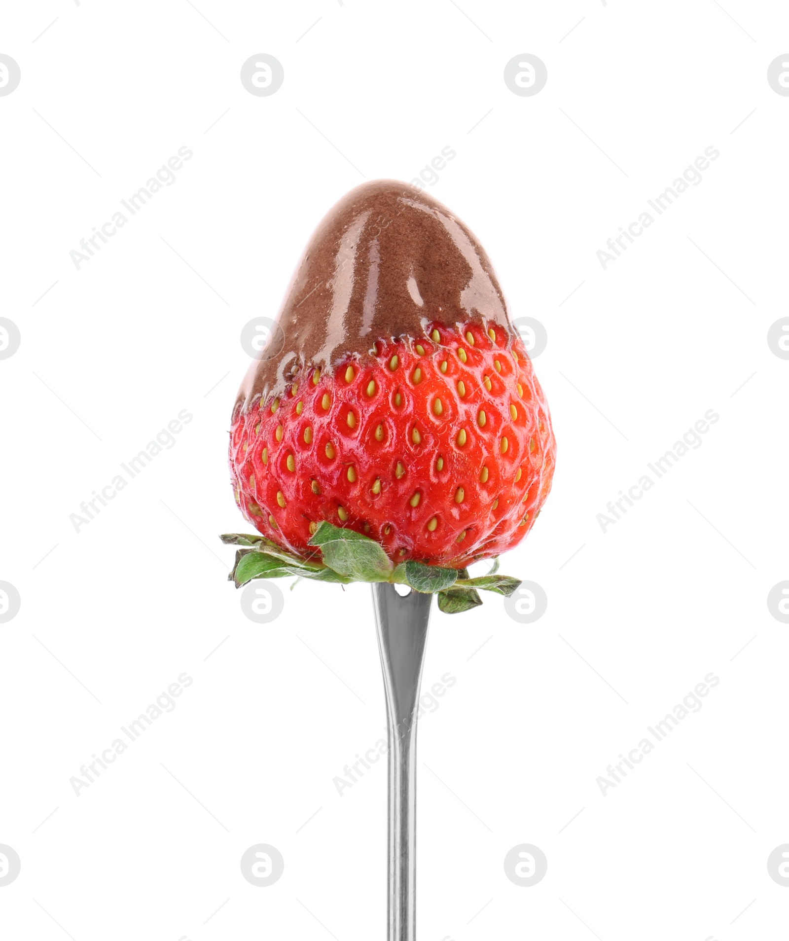 Photo of Strawberry with melted chocolate on fondue fork against white background