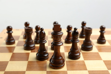 Photo of Chessboard with game pieces. Career promotion concept