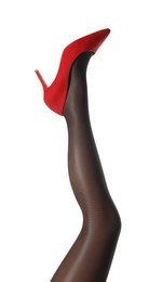 Photo of Woman wearing tights and high heel shoe on white background, closeup