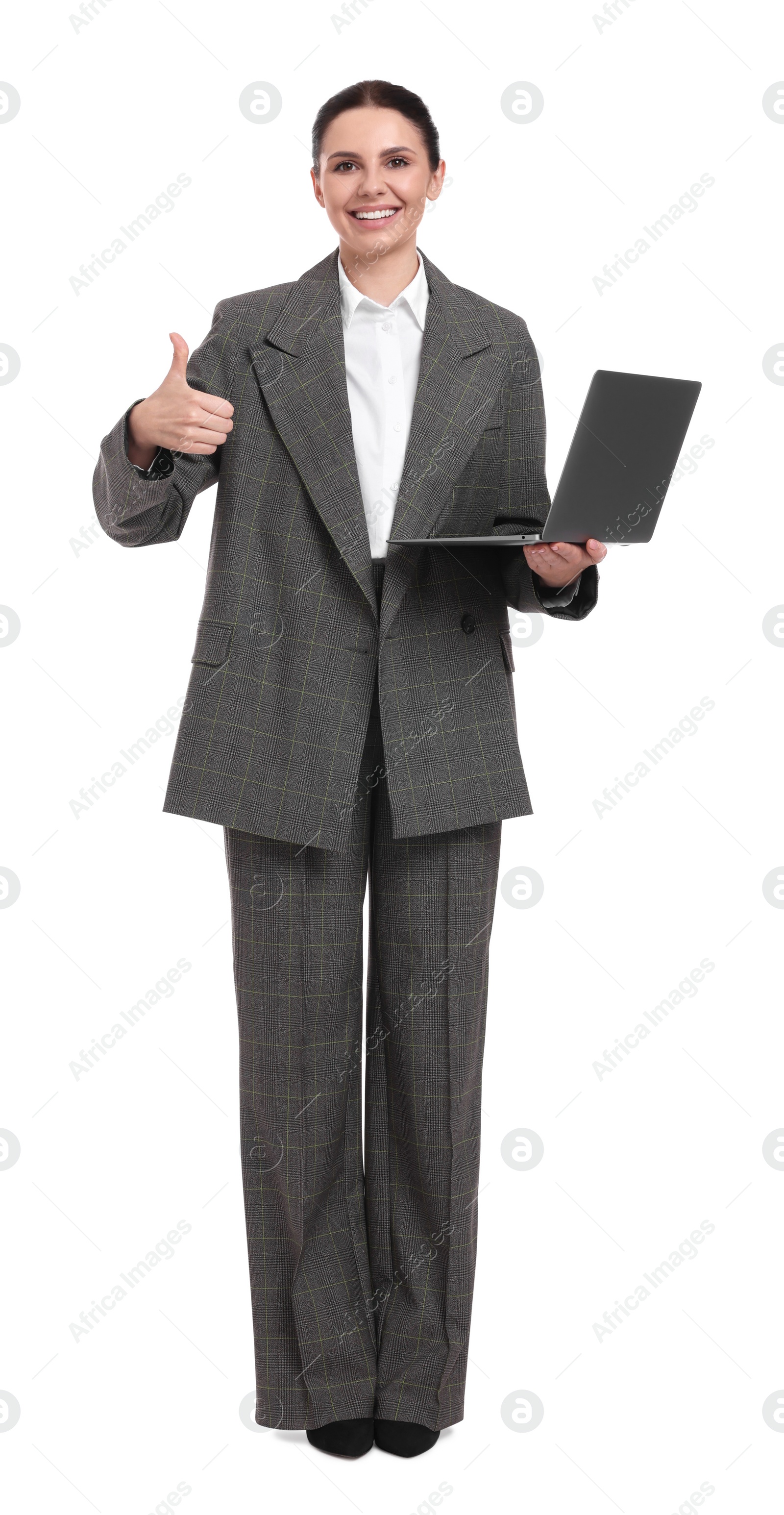 Photo of Beautiful happy businesswoman with laptop showing thumbs up on white background