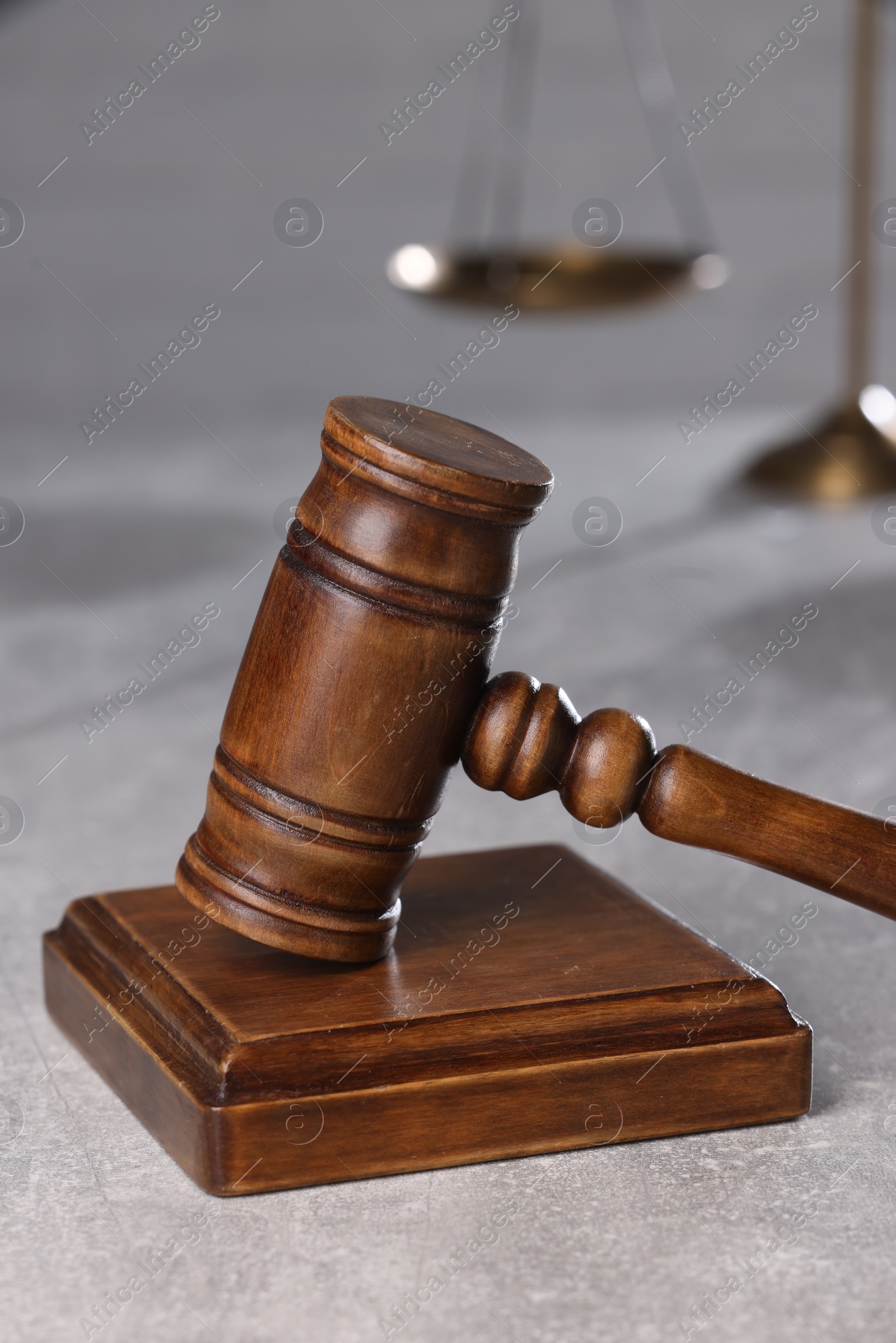 Photo of Law concept. Judge's gavel on light grey table, closeup