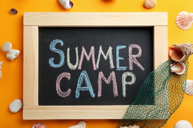 Text "SUMMER CAMP" on chalkboard, top view