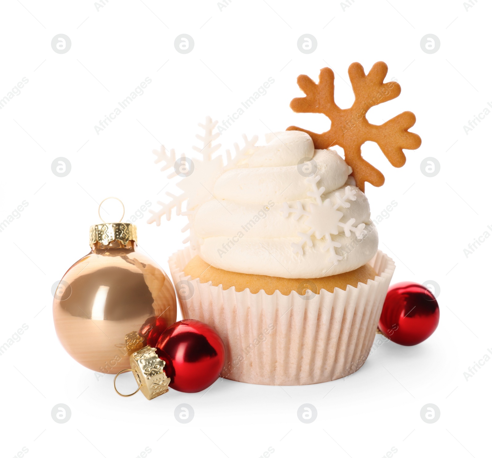 Photo of Tasty Christmas cupcake with snowflakes and baubles on white background