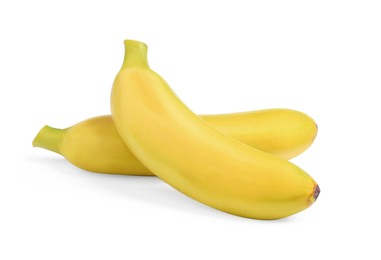 Tasty ripe baby bananas on white background